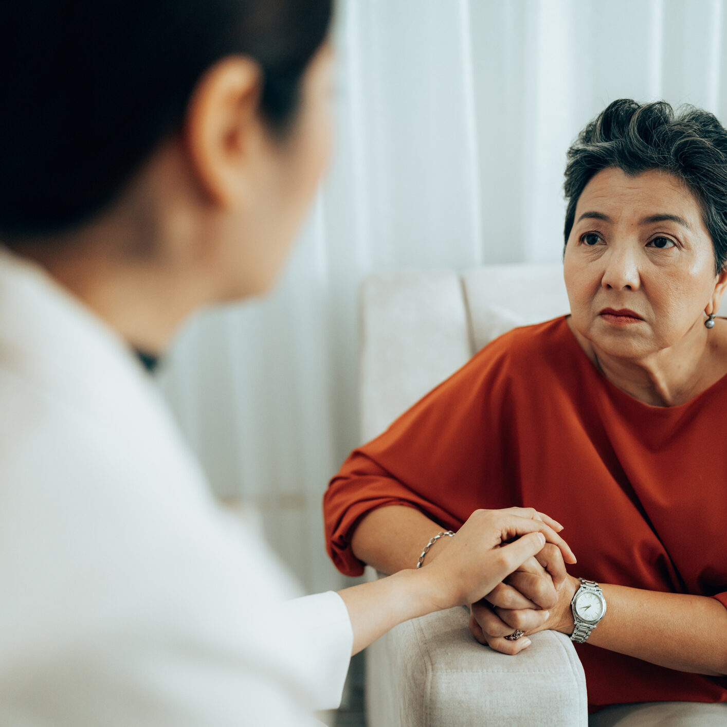 Woman offering comfort to another woman